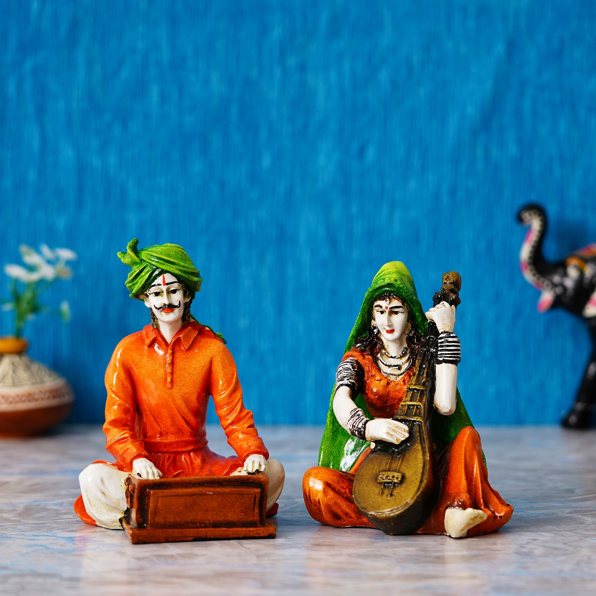 Colorful Combo of Rajasthani Craftsmen and Lady Playing a Musical Instrument Statue 1