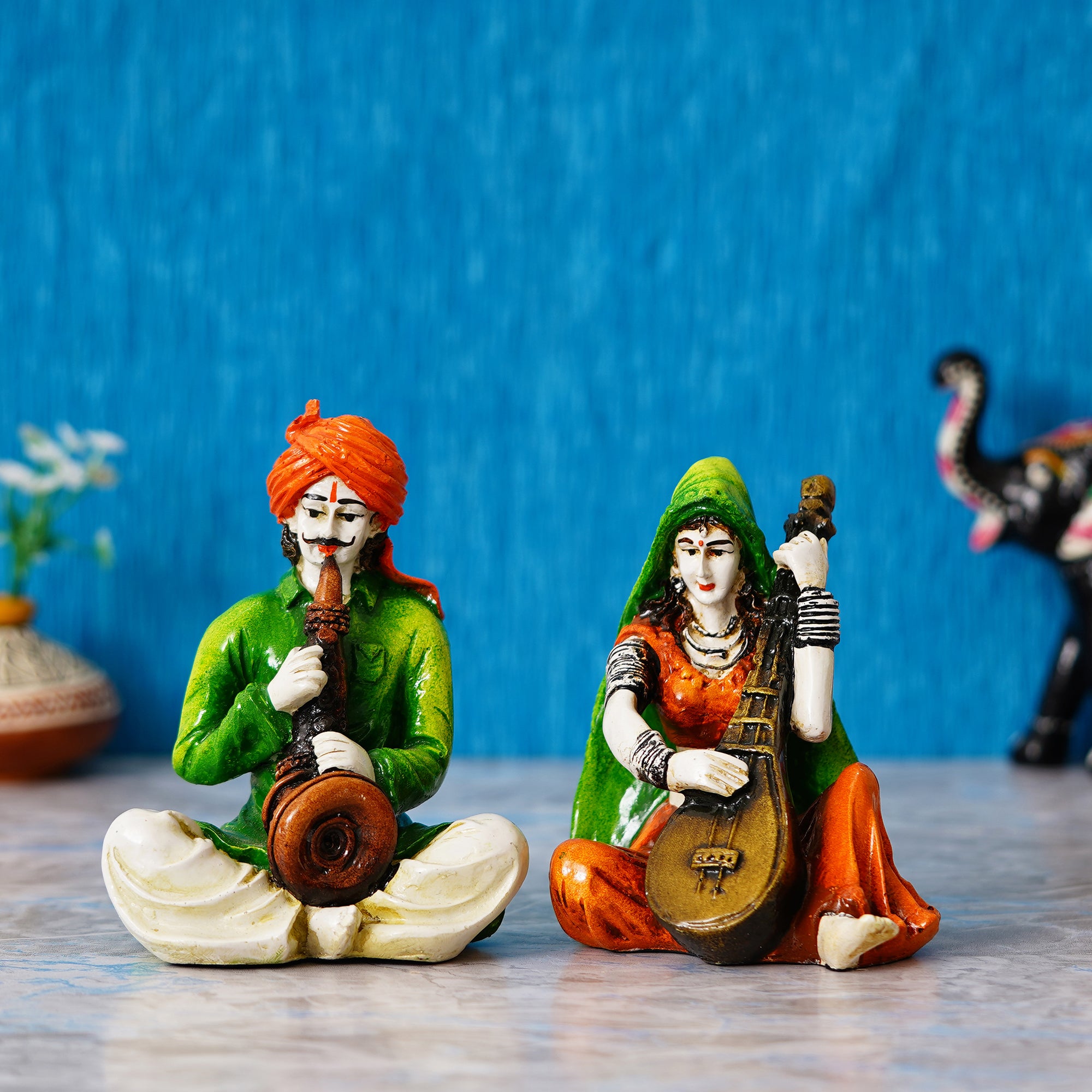 Colorful Combo of Rajasthani Craftsmen and Lady Playing a Musical Instrument Statue 1