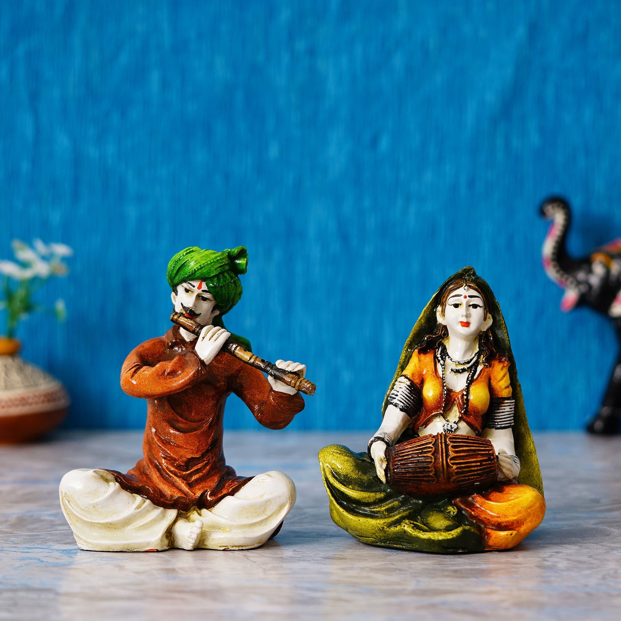 Colorful Combo of Rajasthani Craftsmen and Lady Playing a Musical Instrument Statue 1