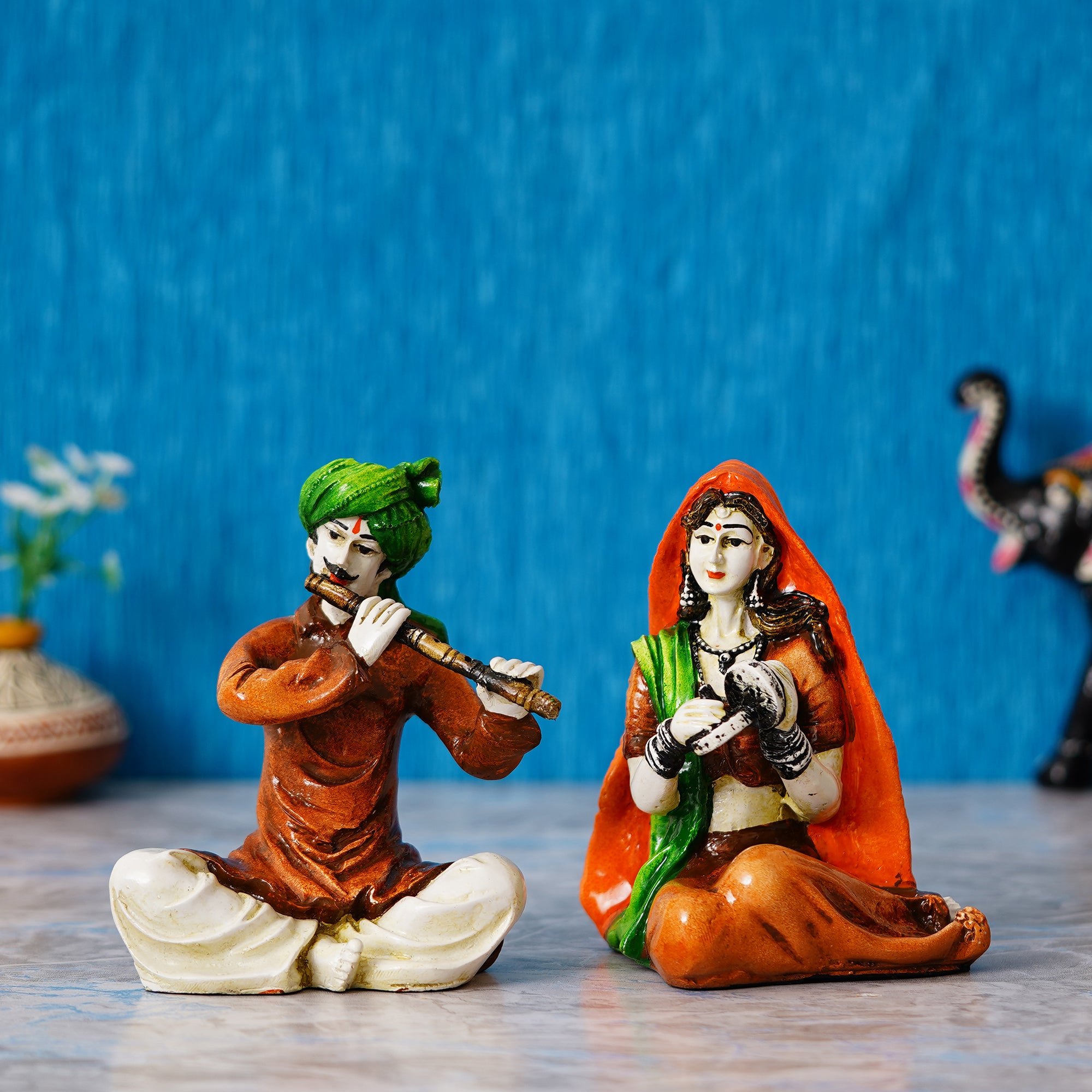 Colorful Combo of Rajasthani Craftsmen and Lady Playing a Musical Instrument Statue 1