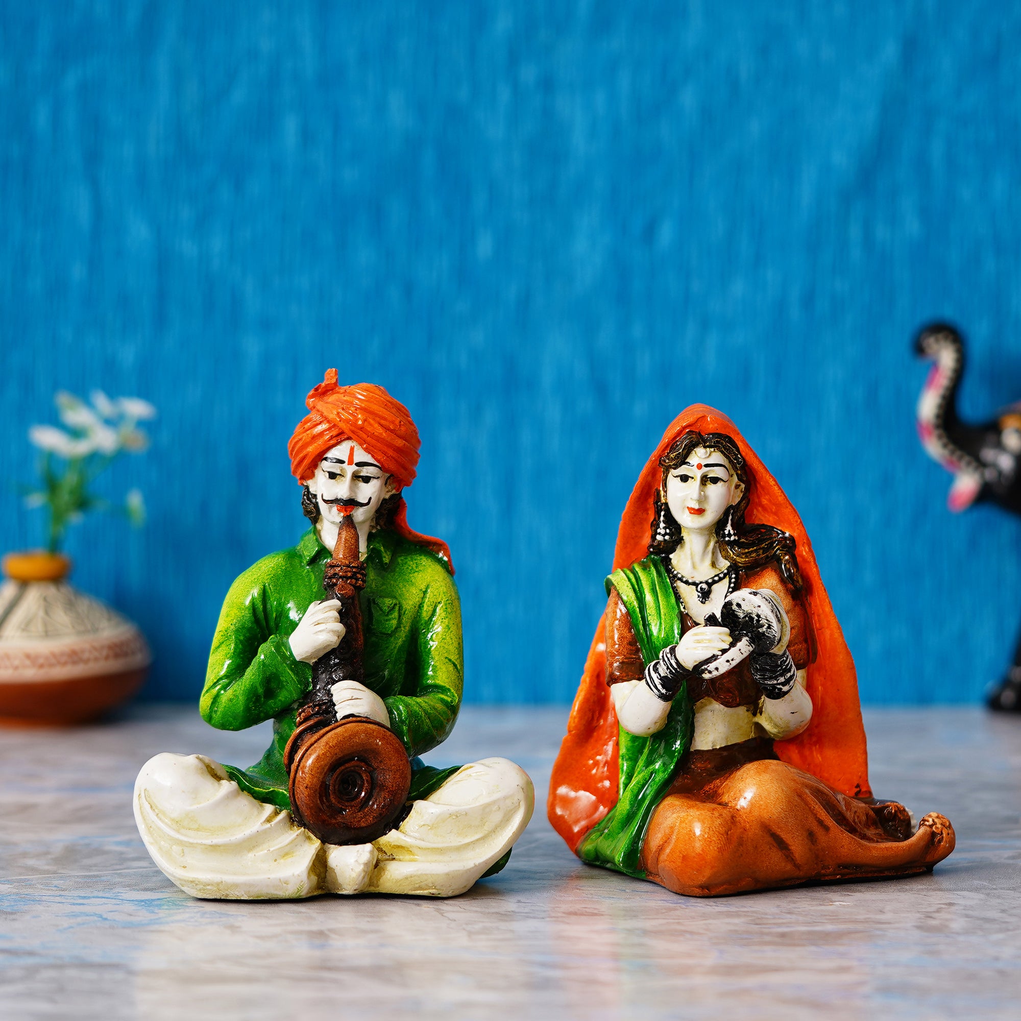 Colorful Combo of Rajasthani Craftsmen and Lady Playing a Musical Instrument Statue 1