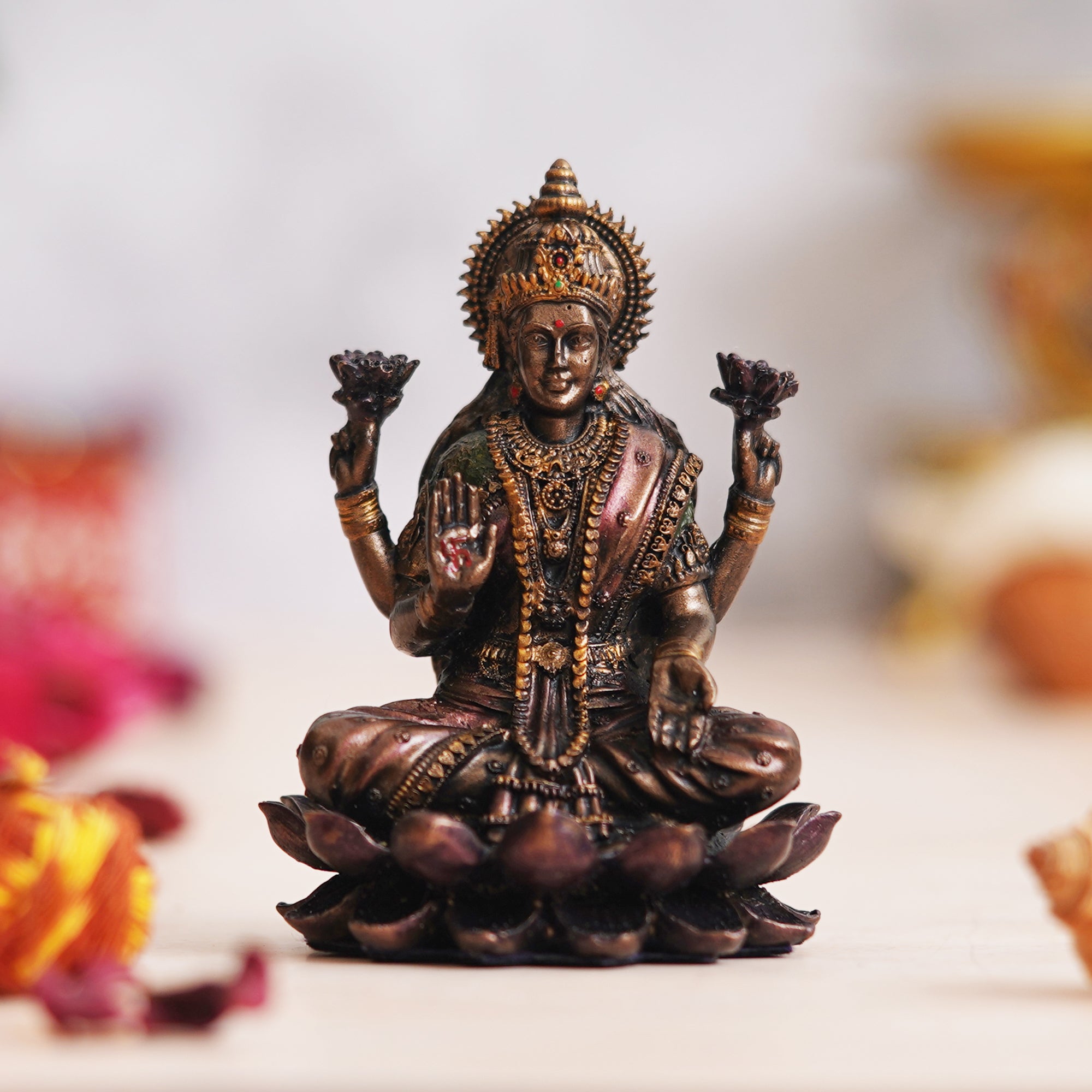 eCraftIndia Polyresin Handcrafted Blessing Goddess Lakshmi Statue sitting on the Lotus Flower