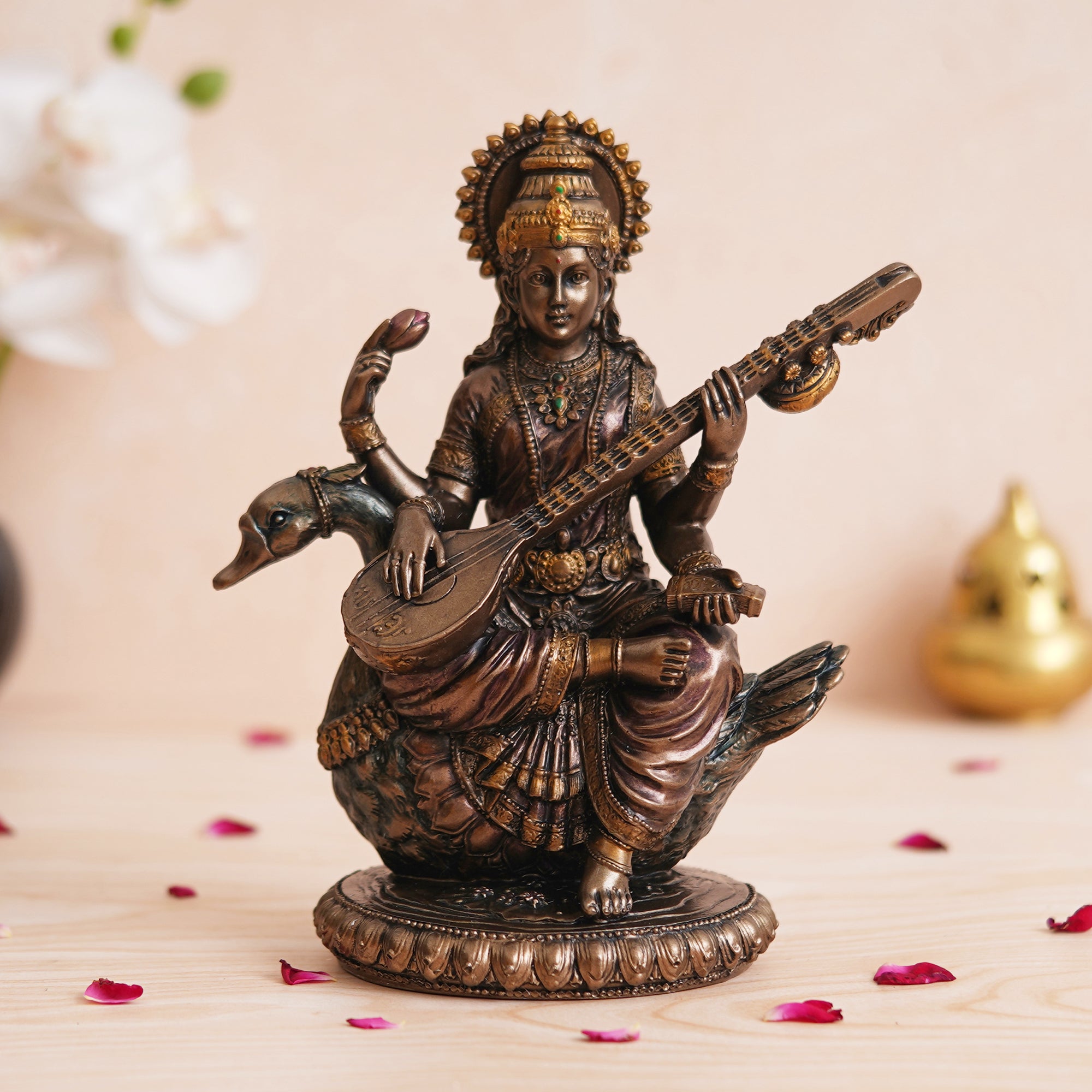 eCraftIndia Goddess Saraswati Idol Sitting on Swan Playing Veena Statue - Goddess of Knowledge, Music, and Art