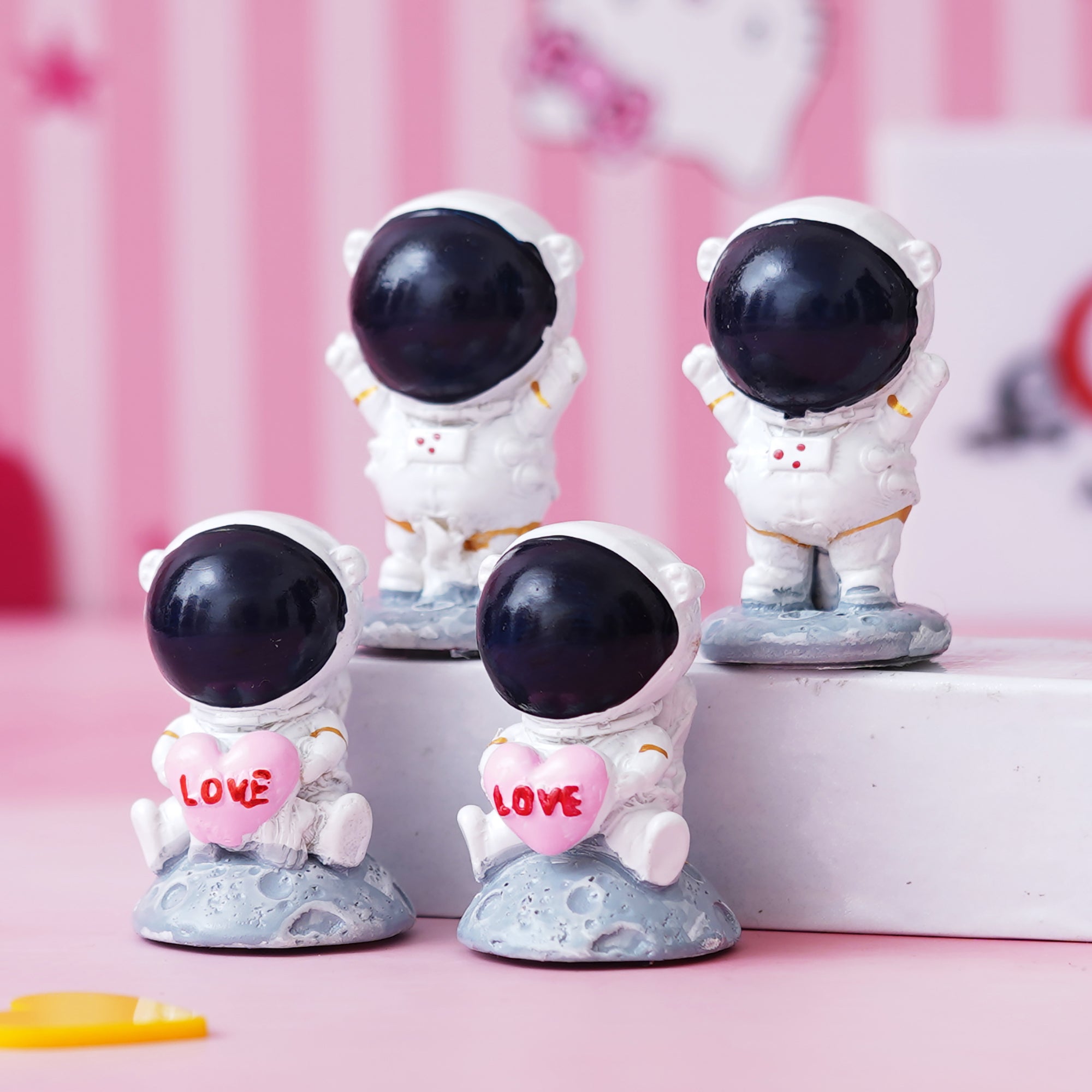 eCraftIndia 4 Astronaut Statues Spaceman Figurines Holding Love Heart Showpieces