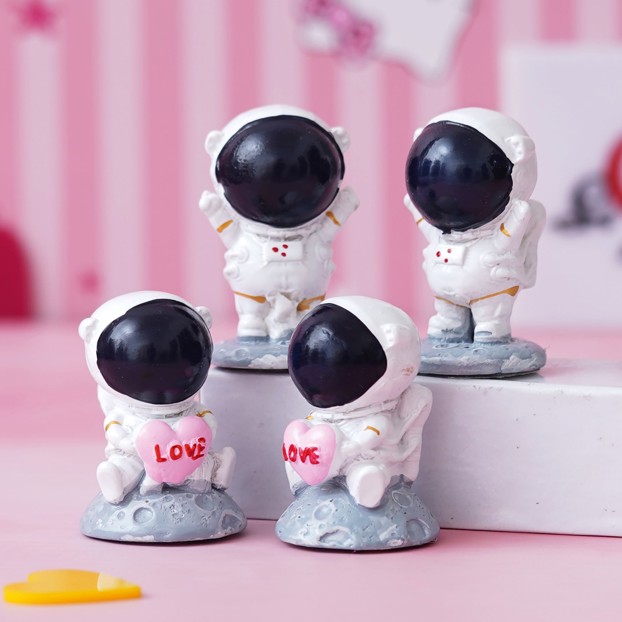 eCraftIndia 4 Astronaut Statues Spaceman Figurines Holding Love Heart Showpieces 5